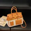Bolso Kelly de Nuevo Color Bloqueado 2026 para Mujer, Bolso de Mano de Moda de Gama Alta para el Trabajo, Bolso Pequeño Cuadrado Cruzado Simple y Versátil
