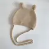 Ins Otoño e Invierno Bebé Coreano Lindo Gorro de Punto con Bola para Niños y Niñas Protección para las Orejas del Bebé Gorro de Lana Cálido con Cordones