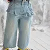 Ropa infantil de estilo coreano para niñas en otoño de 2026: pantalón falda de mezclilla moderno con cintura elástica, volantes y patchwork dulce para niñas pequeñas y niñas