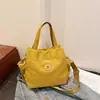Bolso Cubo de Mano Casual Versátil Resistente al Desgaste para Mujer 2025 Invierno Nuevo Elegante Ligero Bolso de Mano Cruzado