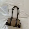 2025 Nueva Bolsa Pequeña Súper Popular para Mujer Diseño de Nicho Bolso para Viajes Diarios Bolso de Bolos Bolso Retro para Axila Hombro Moderno