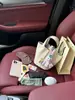 Bolso Cubo 2025 Primavera y Verano Nuevo Estilo Bolso de Mano de Cuero Genuino Bolso de Cuero Genuino de Gama Alta para Mujer Bolso Tipo Cesta de Verduras de Gran Capacidad