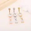 Comercio electrónico transfronterizo popular anillo para el ombligo de gota de agua con cobre incrustado y circonita joyería para perforaciones corporales de acero inoxidable fabricantes en stock al por mayor