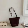 Bolsa de Suede e Pelúcia Simples Retrô Transfronteiriça Feminina 2026 Nova Moda Bolsa de Ombro Único para o Trabalho Bolsa de Balde Pequena de Mão