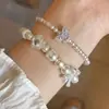 Pulseira Suave Estilo Francês com Pérolas Sintéticas, Diamantes e Borboleta Estrela de Cinco Pontas, Pulseira de Contas Luxuosa com uma Vibe de Menina Rica, Estilo Inspirado em Chanel