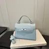 Otoño 2026 Nuevo Bolso Kelly Bolso de Mano Fresco de Gama Alta Bolso Cruzado para Mujer Sentido de Gama Alta Bolso de Diseño de Nicho bolsos
