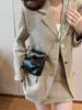 Bolso pequeño de textura popular para mujer 2024 nuevo otoño e invierno combinable con todo cadena cruzada bolso para teléfono móvil moda mini bolsa de agua