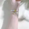 Pulsera de Doble Capa Flor de Durazno Doble Nudo Pulsera Tejida a Mano Xiaohongshu Cuentas Portables Passepartout Dorado Cuentas de Transferencia