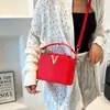 2025 Nueva Moda Color Puro Patrón Tejido Casual Simple Gran Capacidad Bolso de Hombro Cruzado Bolso de Mano Bolso Cubo para Mujeres
