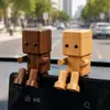 Nuevo ambientador de coche de madera de haya, robot de madera que mueve las piernas, adorno creativo para las rejillas de ventilación del coche, figura de madera