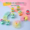 Anel de mola colorido para crianças Mini Smiley Anel arco-íris Anel colorido Tenda Brinquedos de prêmio Fornecimento transfronteiriço