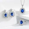 Europa y los Estados Unidos nuevo tres piezas color tesoro copo de nieve azul gema transfronteriza venta caliente lujo lleno diamante collar anillo pendiente mujeres