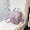 Bolso bandolera moderno y elegante para mujer, bolso de hombro de color liso, nuevo bolso para teléfono de estilo coreano casual y simple primavera 2026