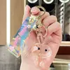 Llavero de Cristal Iridiscente Transparente Acrílico de Dinosaurio Regalo Pequeño Creativo Llavero Lindo para Bolso Coche