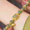 Paso a paso Pulsera china Lotus caliente nueva imitación de jade Hetian pulsera cuadrada de caramelo de loto con cuentas pulsera para mujer regalo de alta gama para mujer