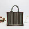 En bolsa de punto color rojo neto bolsa tejida tipo fly bolsa tote versión coreana del nuevo bolso de mano gran capacidad bolsa de compras para estudiante mujer fabricantes