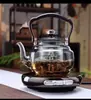 Estufa Eléctrica de Cerámica de Aleación de Gama Alta 1300W Aislamiento Térmico Doméstico Mini Estufa Ultradelgada Cafetera Automática para Té