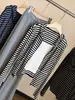 Suéter de punto a rayas estilo coreano para mujer, de moda, con doble cremallera, falso dos piezas, nuevo, con capucha, manga larga, versátil, ajuste ceñido, top tipo jersey