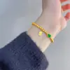 Pulsera de carácter de bendición de calabaza de jade método antiguo oro de arena 5 mm cuentas de oro diseño de cuerda elástica nicho lujo ligero cuentas de transferencia cuentas