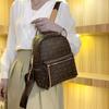 Mochila de marca da moda feminina 2023 nova moda bolsa de estudante universitária europeia e americana versátil simples mochila de viagem de grande capacidade