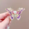 Broche de mariposa de esmalte de alta gama perla moda traje abrigo pin accesorios moda nacional lujo insecto corsage mujer