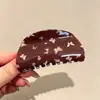 Pinza para el cabello de tamaño mediano de lunares blancos y negros estilo francés, diseñada para la parte trasera de la cabeza, un accesorio para el cabello nuevo y elegante con un aspecto sofisticado y con estilo