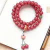 Venda direta da fábrica de pulseiras de sementes de bodhi de jade rosa com laço duplo, contas de raiz de bodhi Primavera das Quatro Estações na cor pêssego para meditação e coleção, atacado