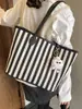 Bolsa Grande de Lona Listrada para Mulheres Outono e Inverno 2026 Nova Bolsa de Ombro de Grande Capacidade Bolsa Tote Casual Fashion