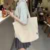 Estética de estilo japonês e estilo ocidental Personalizado Casual Ombro Pano Bolsa Bolsa de Classe de Estudante Feminina Nicho Commuter Tote Big Bag