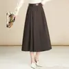 Falda plisada de color liso con temperamento para mujer, llegada nueva Otoño Invierno 2026, falda de línea A versátil y adelgazante con caída, traje