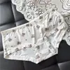 [80-120] 524 Seda de Hielo estampado lindo tiro bajo bolsa de ropa interior para mujer cadera con taladro ropa interior para mujer tiro bajo