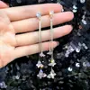 Joyería de moda coreana nuevo deseo Amazon AliExpress ebay pendientes de botón con borla de mariposa de cristal al por mayor