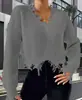 Amazon Europeo y Americano 2024 Nueva Moda Cuello en V Casual Cuello Alto Holgado Agujero Borla Manga Larga Suéter Camisa de Punto