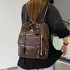 2026 Mochila Simple Juvenil Estilo Nuevo Gran Capacidad para Viajes Diarios Doble Hombro Hombro Único Otoño Coreano Superficie Brillante Estilo Japonés de Nicho