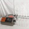 Máquina llenadora semiautomática manual de líquidos eléctrica CNC para bebidas, vino tinto, jugo, subllenado, aceite medicinal pequeño, perfume