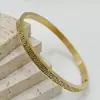 Moda Transfronteriza Europea y Americana Hueco Patrón de la Gran Muralla Acero de Titanio Acero Inoxidable Pulsera Estilo Palacio Retro Nicho Accesorios de Lujo