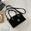 Bolso tote de mano de moda transfronterizo 2026, bolso de hombro de moda vintage, bolso de axila de nicho de alta gama