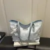 2026 Verão Nova Moda Casual Estilosa Bolsa Grande Capacidade com Textura Simples Bolsa de Ombro Feminina Atacado Bolsas Femininas
