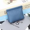 Monedero de piel auténtica para mujer, nuevo producto, con cierre automático, para guardar pintalabios, bolso pequeño de piel de vaca con capa superior y monedero para auriculares.
