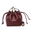 Bolso tipo cubo retro estilo coreano para mujer, nuevo bolso cruzado de moda casual 2026, bolso de hombro con cadena exquisito y simple