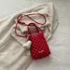 Mini bolso cubeta de lunares estilo coreano para mujer, nuevo modelo 2026, bolso de mano dulce y femenino, bolso cruzado para teléfono versátil de nicho