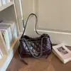 Bolso grande de mujer vintage para otoño e invierno 2026 nuevo diseño de moda bolso de hombro acolchado bordado bolso cruzado bolso tote