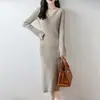 Vestido de punto de lana pura con cuello en V y manga larga, vestido largo de otoño e invierno con manga acampanada por encima de la rodilla, vestido suéter ajustado bodycon