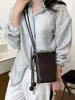 Bolso de axila tejido texturizado para mujer, nuevo modelo 2026, bolso para teléfono de cuero encerado, bolso tipo cubo, bolso cruzado versátil de verano