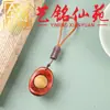O pingente de durian de sândalo pode ser usado como um item decorativo para artesanato com tema de frutas, acessórios de carro, mesas de chá, salas de estar ou como um ornamento para casais para carregar por aí.