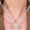 Collar con colgante de perla morada con incrustaciones de diamantes estilo retro francés, elegante y atmosférico, cadena de lana nueva de moda única.