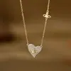 Electrochapado en oro real circón microincrustado cadena para clavícula de temperamento para mujer sensación de alta gama estilo ins collar exquisito collar de amor al por mayor