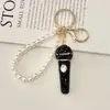 Chaveiro de Microfone 3D com Pedras Strass de Luxo Leve Transfronteiriço Microfone de Strass Super Brilhante Encanto Requintado para Bolsa com Contas de Pérola