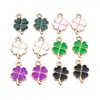 Nuevo color trébol trébol de cuatro hojas gota de aceite accesorios DIY accesorios para joyería llavero colgante para teléfono móvil venta al por mayor