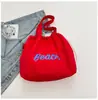Bolsa de Ombro Única com Estampa de Letras de Grande Capacidade Estilo Coreano Feminina 2026 Nova Moda Bolsa Tote Casual Bolsa de Mão com Cordão